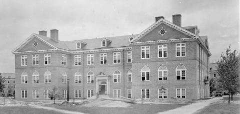 Black and white photo of the rear facade and entrance to Tyler Hall