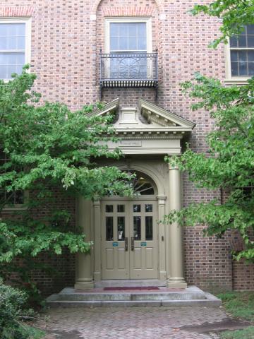 Entrance to Monroe Hall featuring double doors and ornate trim work