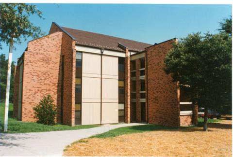 One of the Randolph Complex buildings with walking path in front