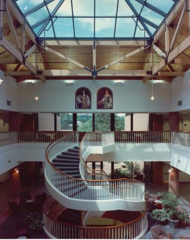 Interior of the Sadler Center with skylight above and circular stairwell in the center of the main atrium