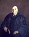 Alvin Seater portrait of Chandler wearing black regalia