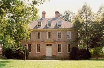 Front facade of the Brafferton, a three story brick house 