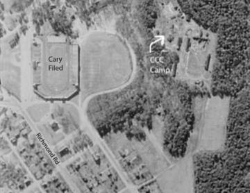 Aerial view of the CCC camp located to the right of Cary field and surrounded by woods