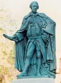 Front view of the statue of Lord Botetourt in front of the Wren Building