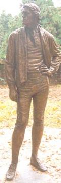 Statue of Thomas Jefferson standing and looking to one side