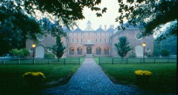 Rear facade of the Wren Building with fence surrounding the center courtyard