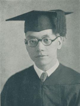 Black and white photo of Ming Pan in cap and gown