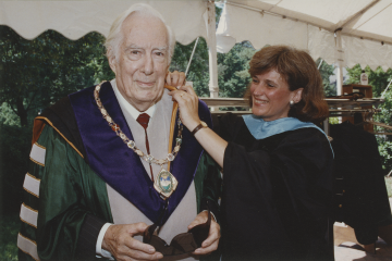 Warren E. Burger wearing an academic gown and the Chancellor's Chain and Badge during W&M Commencement, 1993